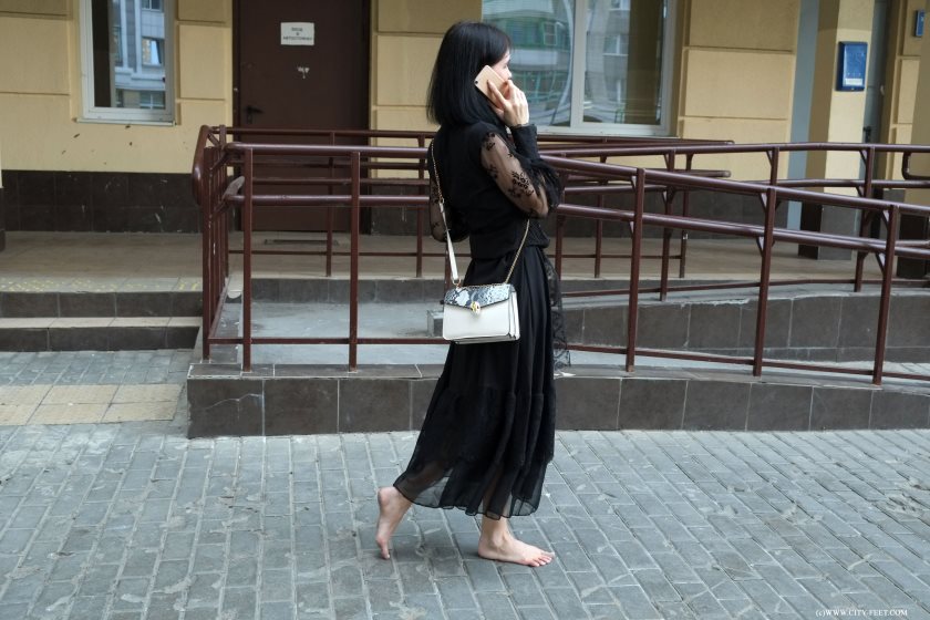 Poster for Hot Brunette In A Black Dress. Part 2. - City Feet - Dora - Barefoot In City, Closeups (Городские Ноги Босиком По Городу)